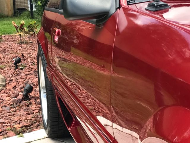1989 Burgundy Ford Mustang Hatchback