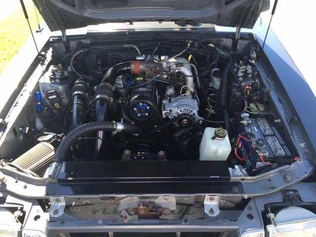 19850000 two-tone gray Ford Mustang Hatchback