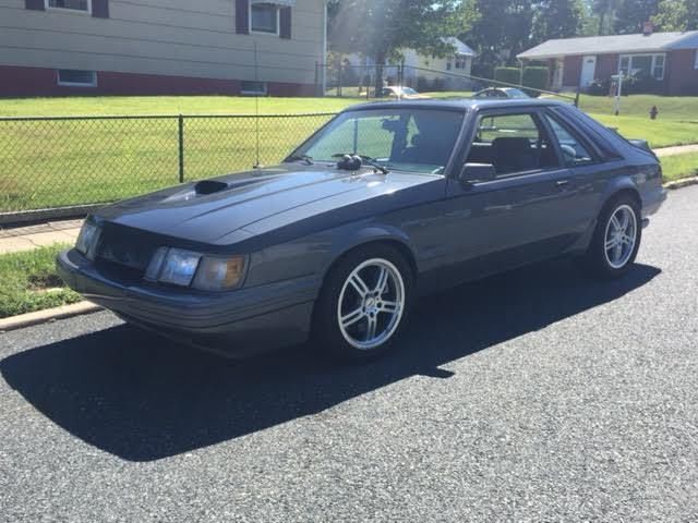 19850000 two-tone gray Ford Mustang Hatchback
