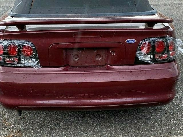 1994 Burgundy Ford Mustang Convertible