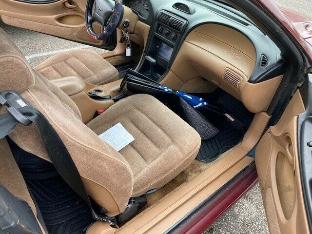 1994 Burgundy Ford Mustang Convertible