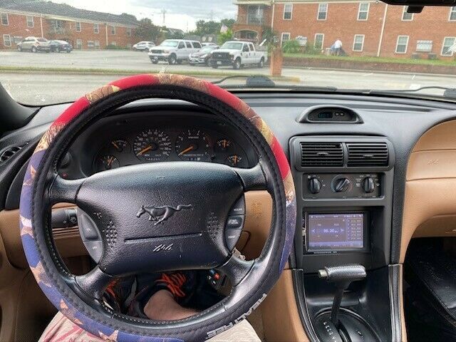 1994 Burgundy Ford Mustang Convertible