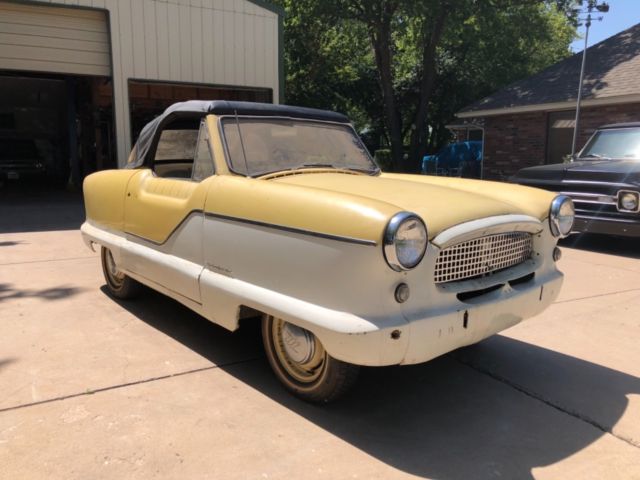 1960 yellow/white Nash Metropolitan Convertible