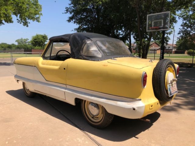 1960 yellow/white Nash Metropolitan Convertible