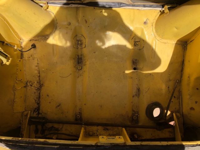 1960 yellow/white Nash Metropolitan Convertible