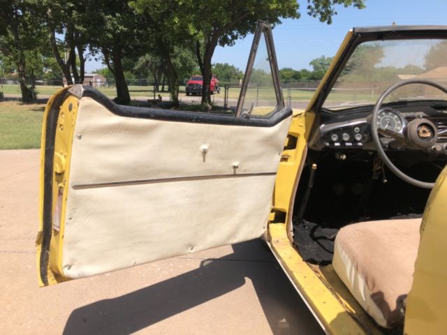 1960 yellow/white Nash Metropolitan Convertible