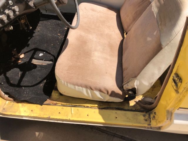 1960 yellow/white Nash Metropolitan Convertible