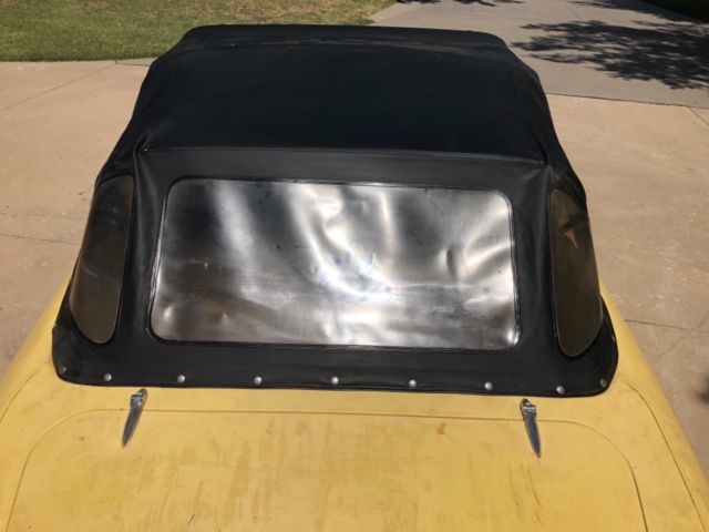 1960 yellow/white Nash Metropolitan Convertible