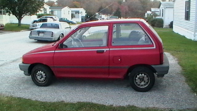 1990 Red Ford Festiva Hatchback