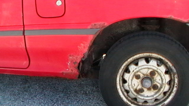 1990 Red Ford Festiva Hatchback