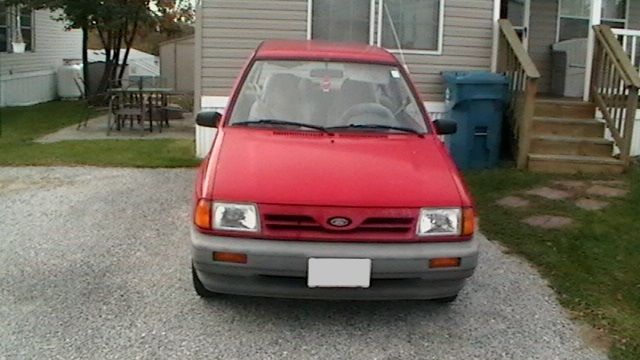 1990 Red Ford Festiva Hatchback