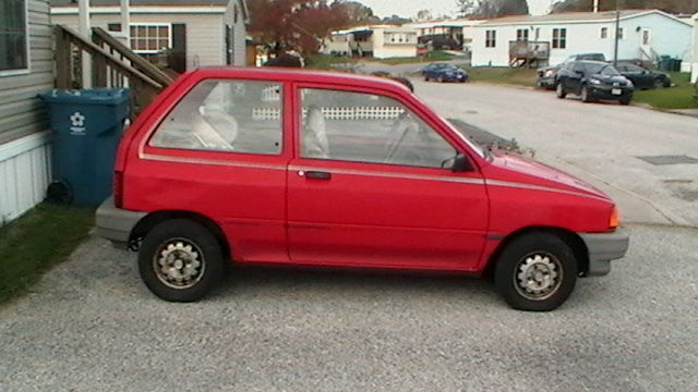 1990 Red Ford Festiva Hatchback