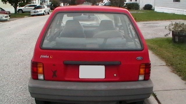 1990 Red Ford Festiva Hatchback