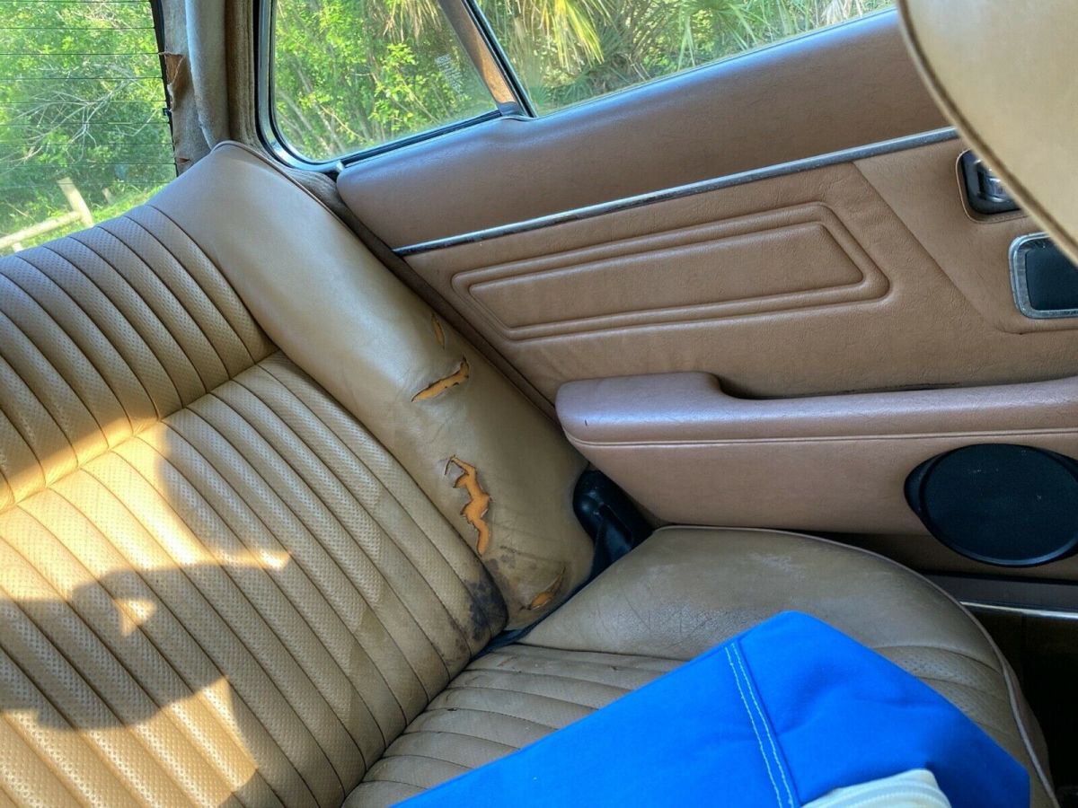 1974 Burgundy Jaguar XJ6 Sedan