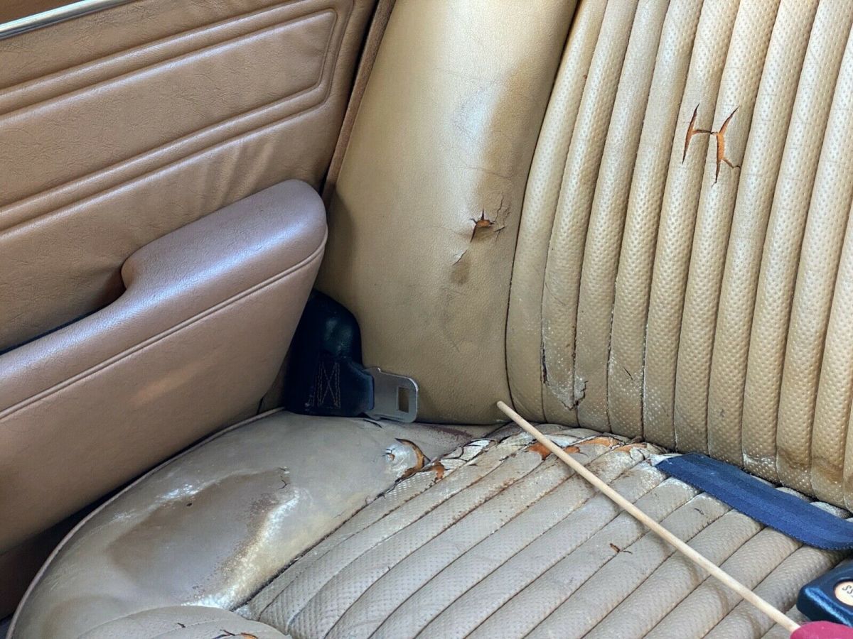 1974 Burgundy Jaguar XJ6 Sedan