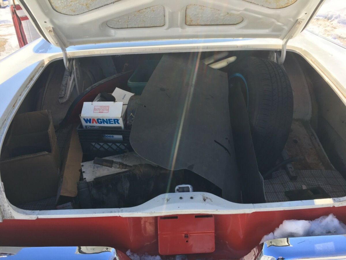 1957 Red , White Ford Fairlane Sedan