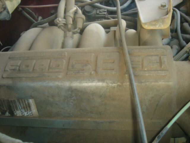 1992 Red Ford F-150 Standard Cab Pickup