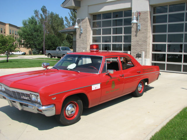 1966 Fire Engine Red Chevrolet Bel Air/150/210 4 door