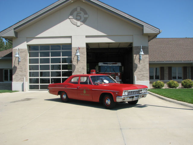 1966 Fire Engine Red Chevrolet Bel Air/150/210 4 door