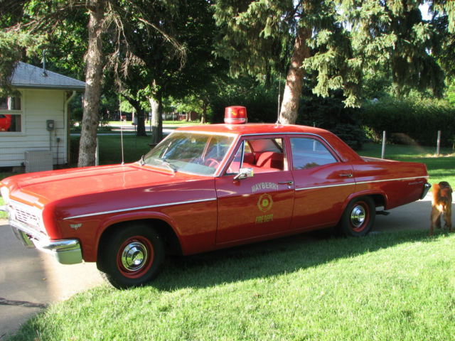 1966 Fire Engine Red Chevrolet Bel Air/150/210 4 door