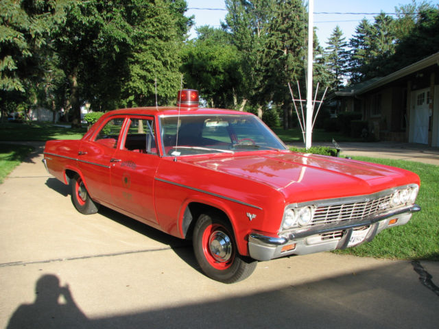 1966 Fire Engine Red Chevrolet Bel Air/150/210 4 door