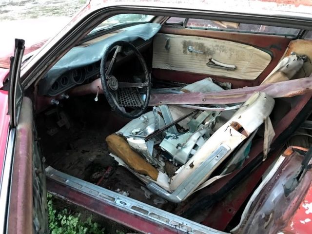 1965 red Ford Mustang Coupe