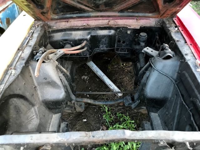 1965 red Ford Mustang Coupe