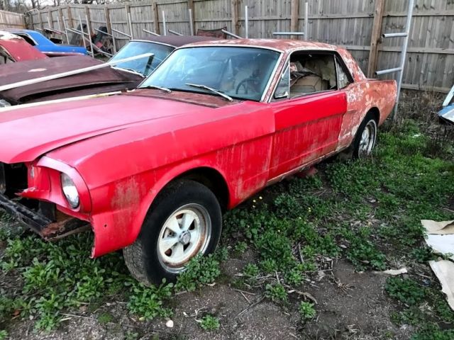 1965 red Ford Mustang Coupe