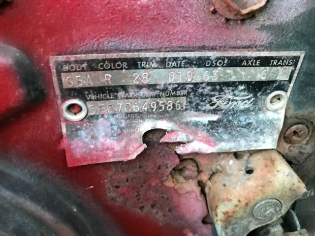 1965 red Ford Mustang Coupe