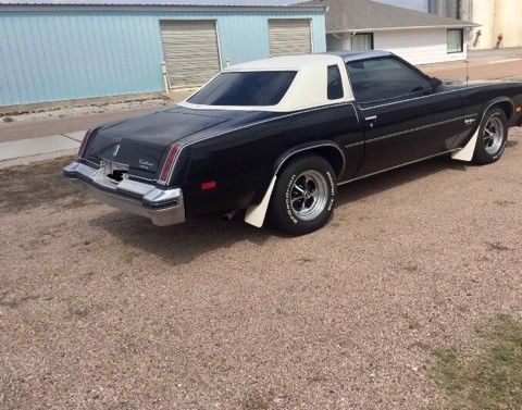 1977 Black Oldsmobile Cutlass Coupe