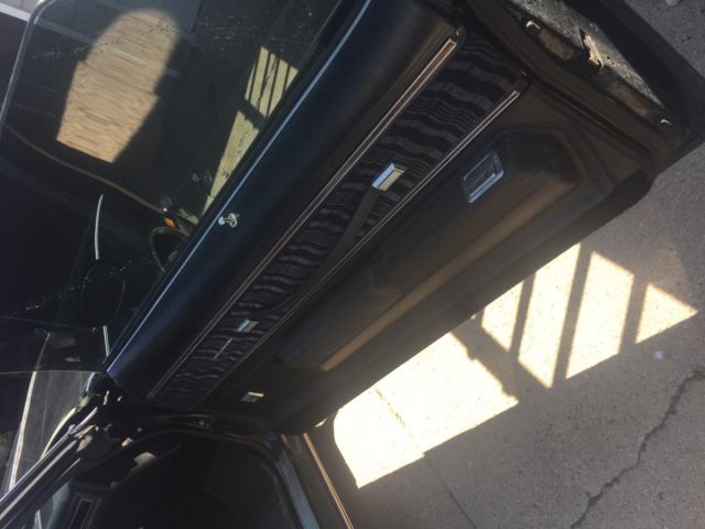 1977 Black Oldsmobile Cutlass Coupe