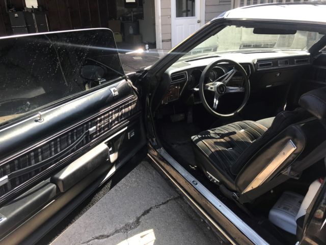 1977 Black Oldsmobile Cutlass Coupe