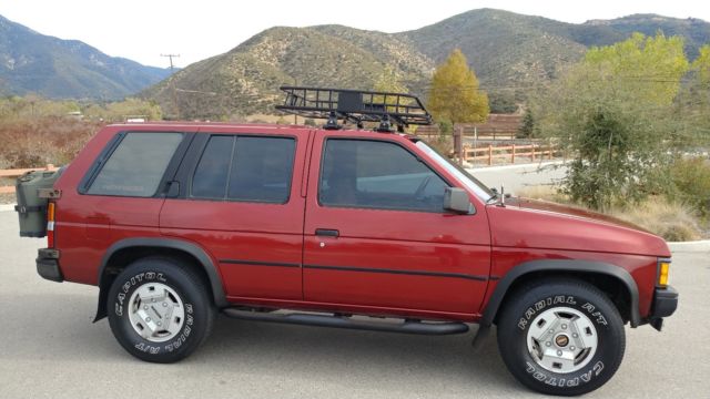 1990 Burgundy Nissan Pathfinder SUV