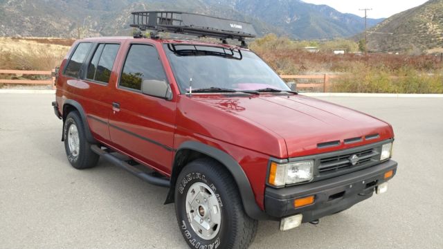 1990 Burgundy Nissan Pathfinder SUV