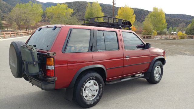1990 Burgundy Nissan Pathfinder SUV