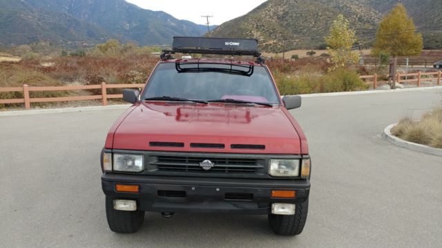 1990 Burgundy Nissan Pathfinder SUV