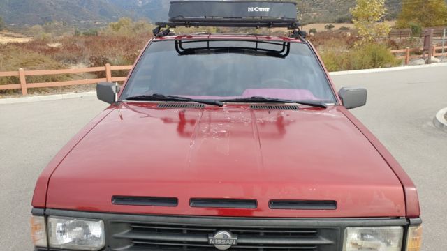 1990 Burgundy Nissan Pathfinder SUV