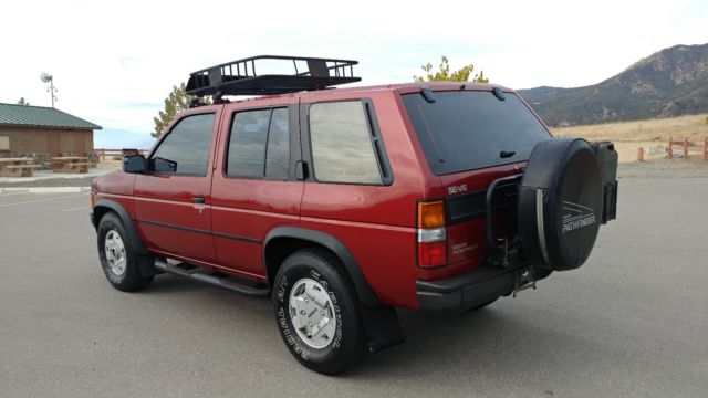 1990 Burgundy Nissan Pathfinder SUV
