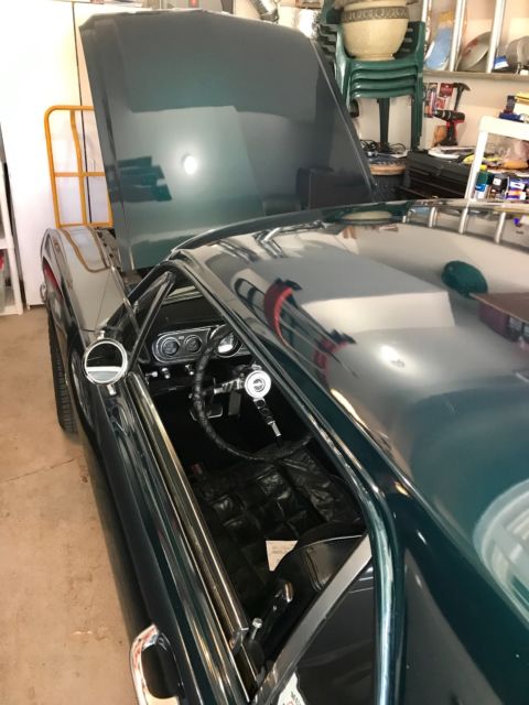 1966 Metallic green Ford Mustang Sedan