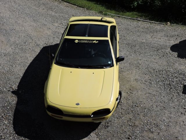 1992 Yellow Nissan NX Hatchback