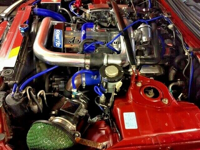 1980 red/burgundy  metalic. Nissan GT-R