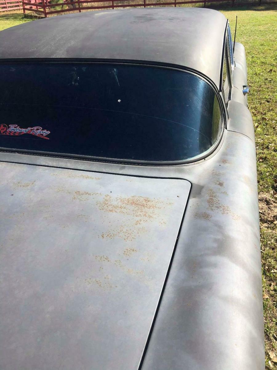1958 Black Chevrolet Biscayne 4 DOOR (REAR HANDLES SHAVED)