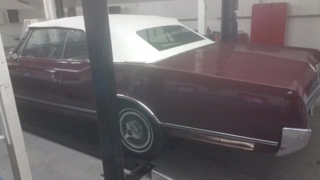 1966 Burgundy Oldsmobile Eighty-Eight Convertible