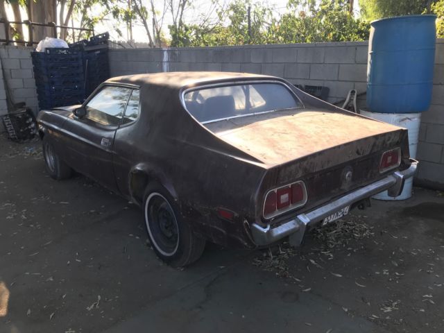 1973 Burgundy Ford Mustang Hardtop