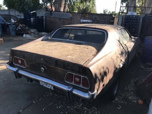 1973 Burgundy Ford Mustang Hardtop