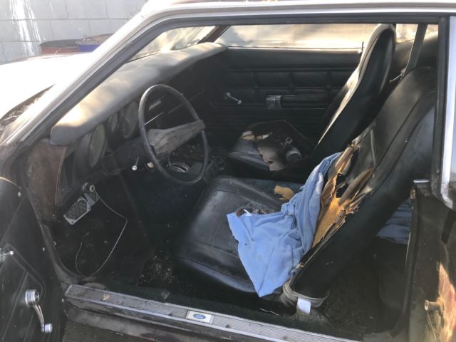 1973 Burgundy Ford Mustang Hardtop