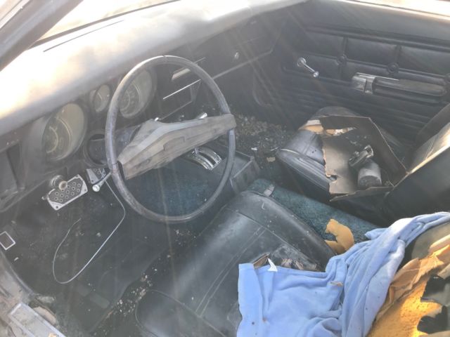 1973 Burgundy Ford Mustang Hardtop