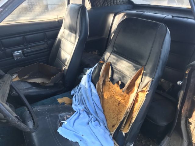 1973 Burgundy Ford Mustang Hardtop