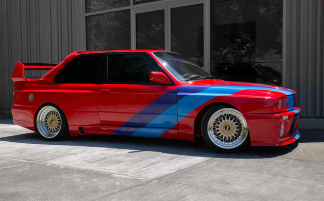 1988 red BMW M3 Coupe