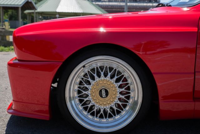 1988 red BMW M3 Coupe